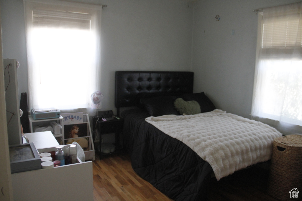 Bedroom with wood finished floors