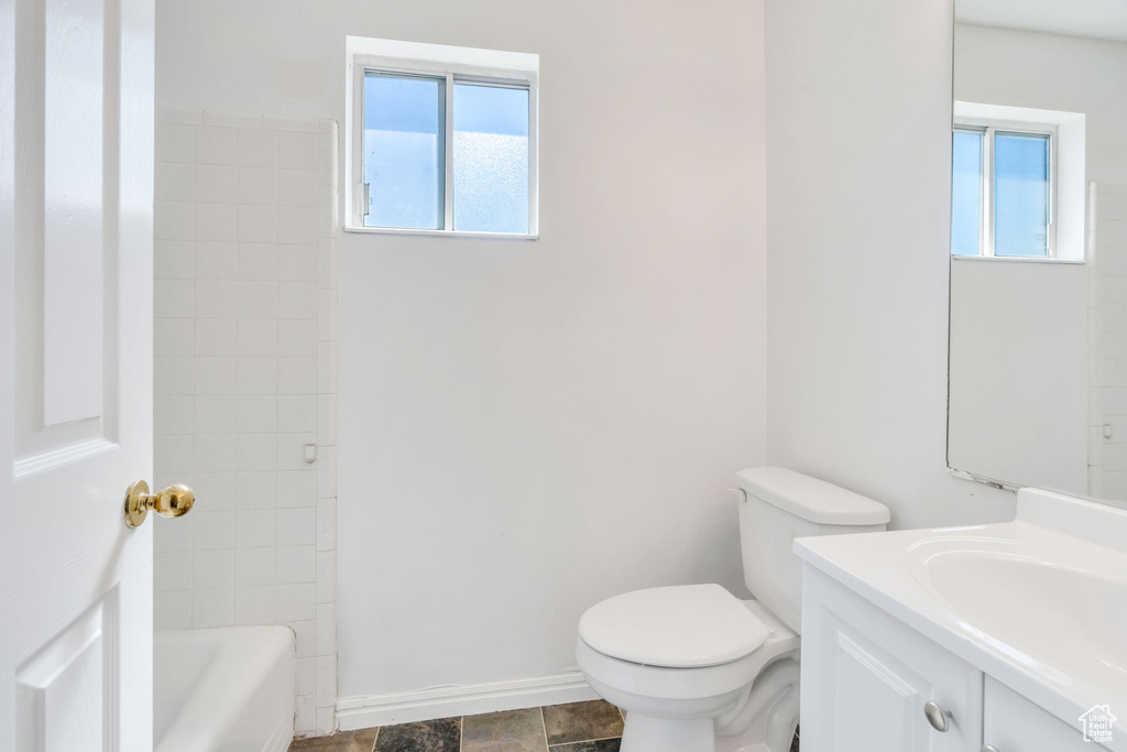 Bathroom with toilet and vanity