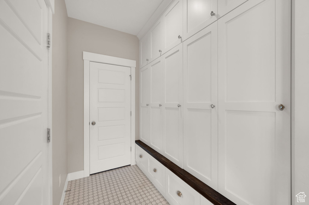 Mudroom featuring baseboards