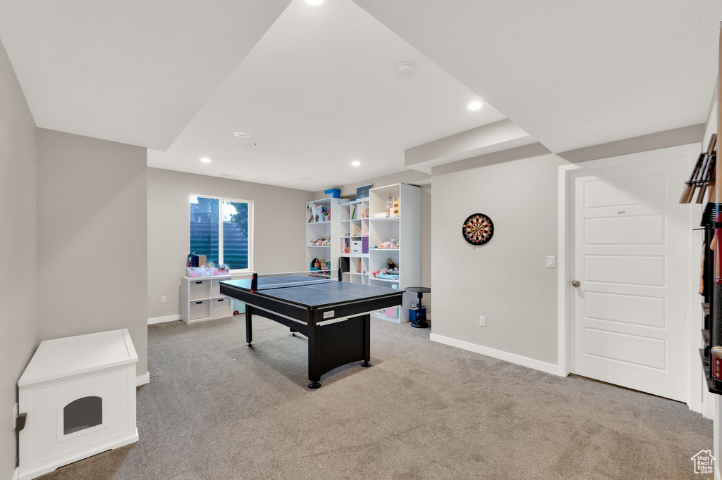 Recreation room with recessed lighting and carpet