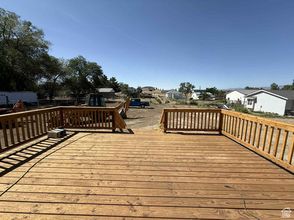Wooden deck with a residential view