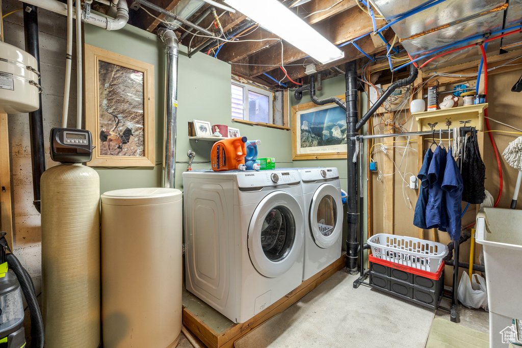 Washroom featuring washer and dryer
