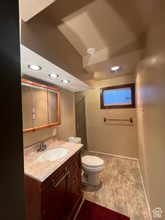 Full bath featuring vanity, a shower, and recessed lighting
