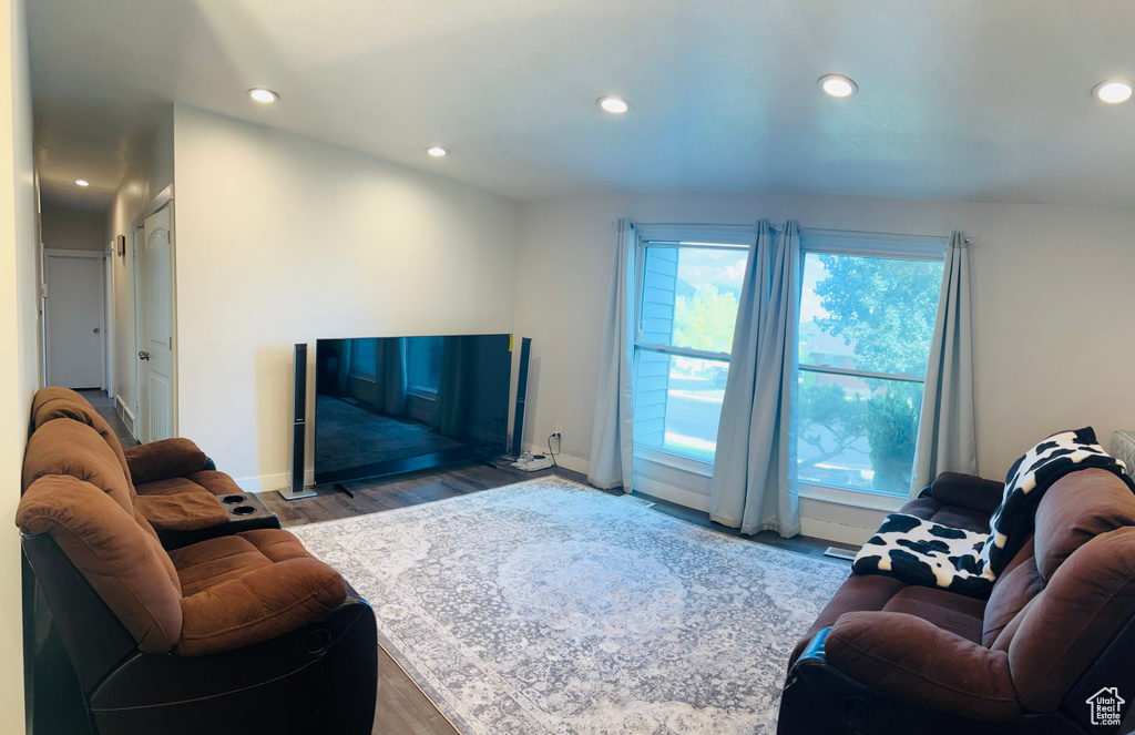 Living area featuring recessed lighting and wood finished floors