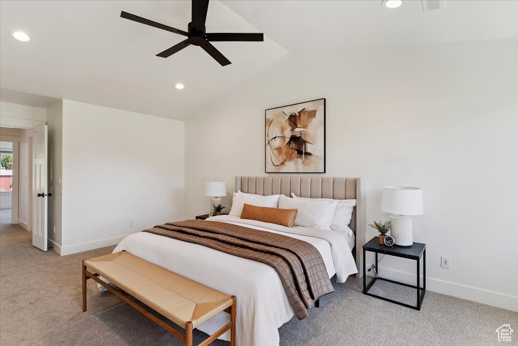 Bedroom with carpet flooring, recessed lighting, vaulted ceiling, and a ceiling fan