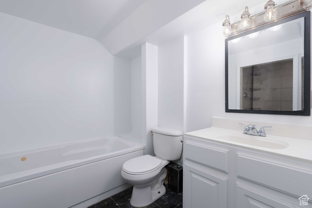 Full bath featuring toilet and vanity