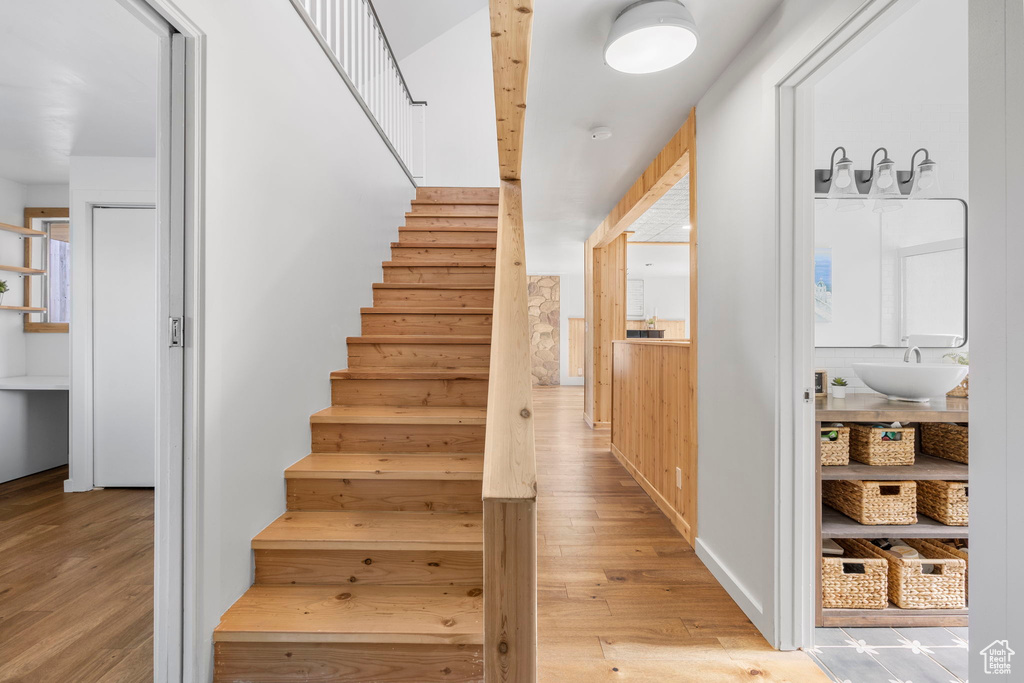 Staircase with wood finished floors