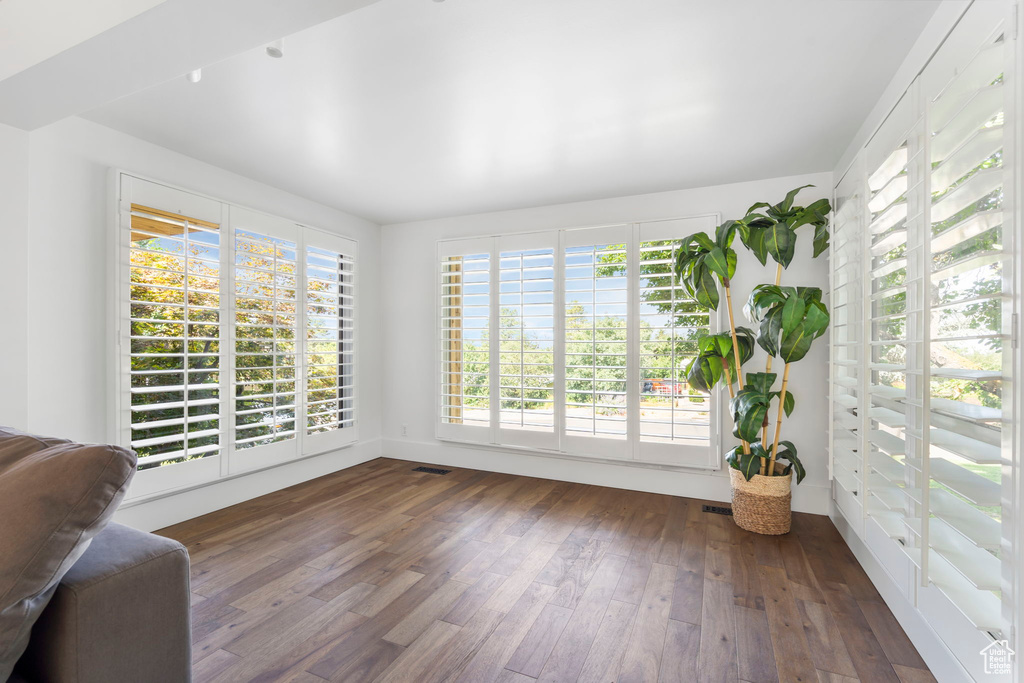 Unfurnished sunroom with healthy amount of natural light