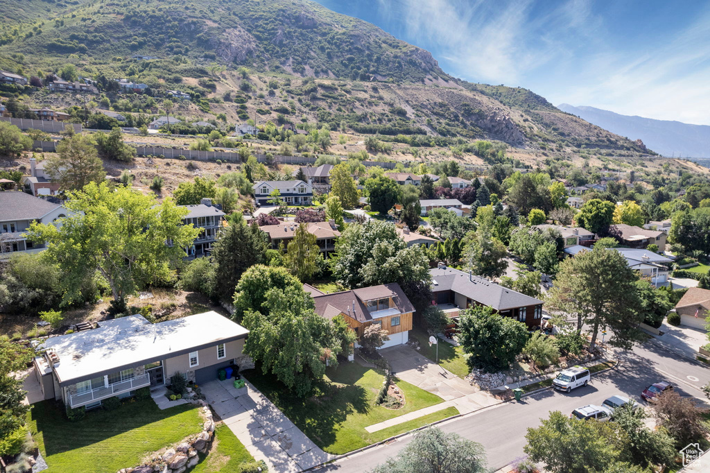 Aerial view of residential area with a mountain backdrop