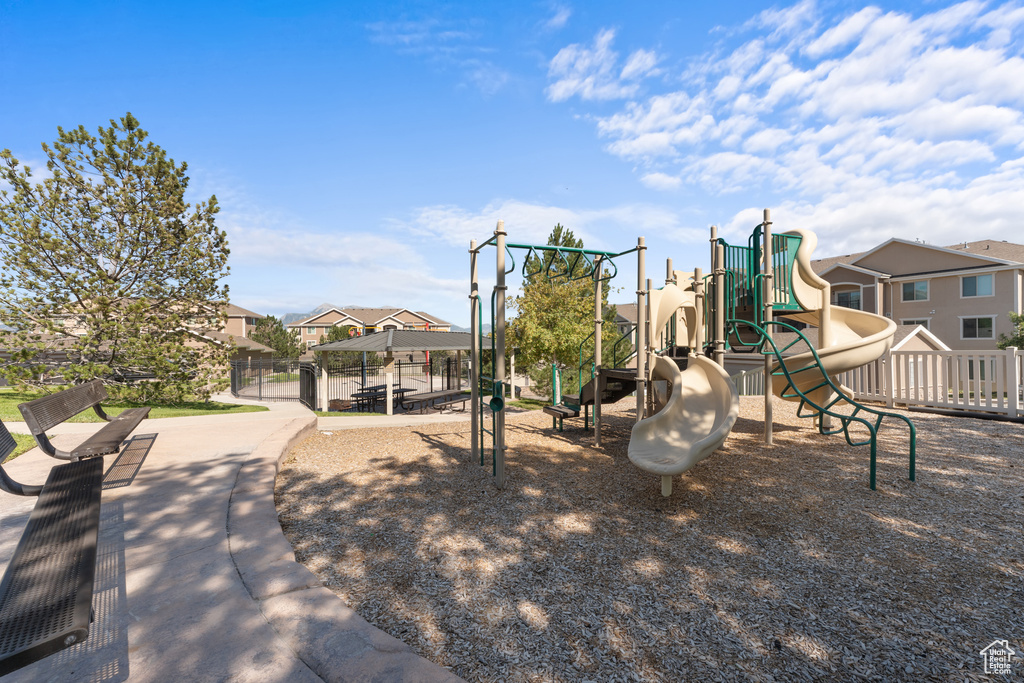 Community play area featuring a residential view and a gazebo
