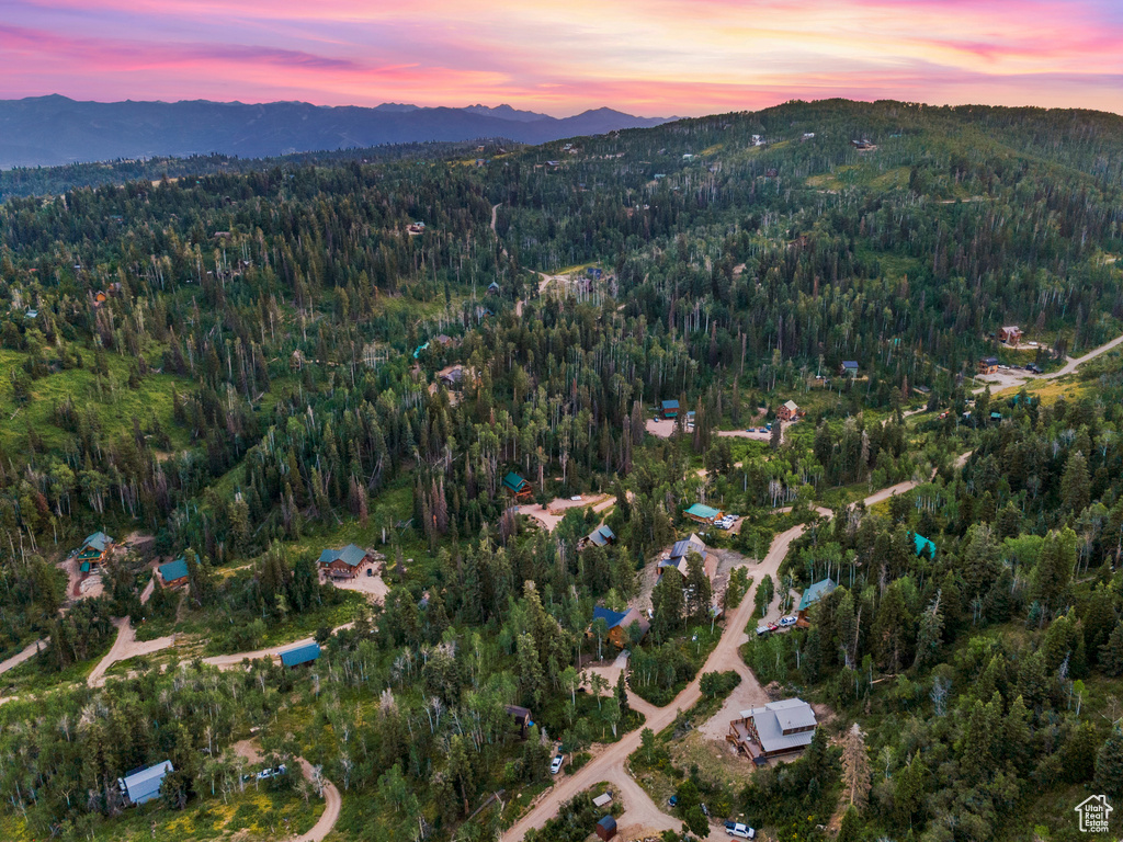 Aerial view of property's location with mountains