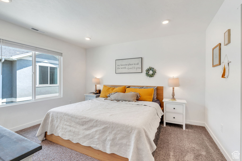 Bedroom featuring carpet floors and recessed lighting
