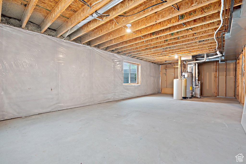 Below grade area featuring gas water heater