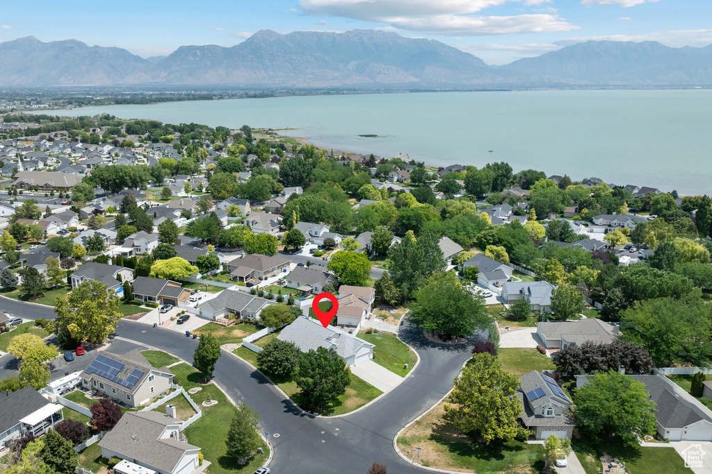 Aerial view of residential area featuring a water and mountain view