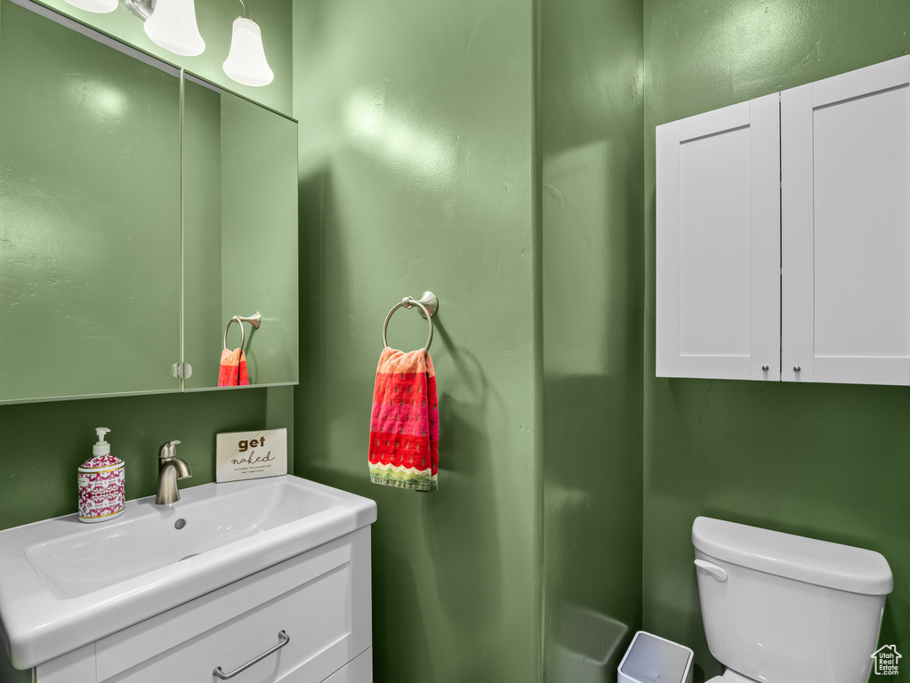 Bathroom with vanity and toilet