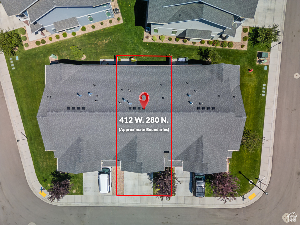 Aerial view of property and surrounding area featuring property parcel outlined