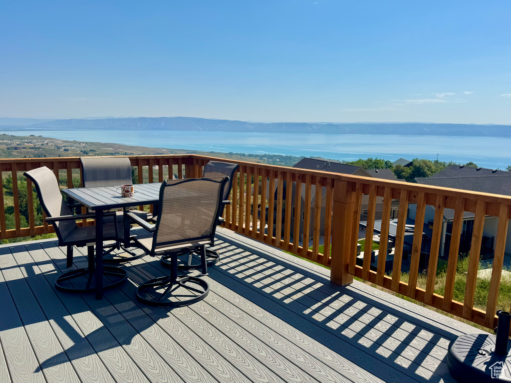Wooden terrace featuring outdoor dining space