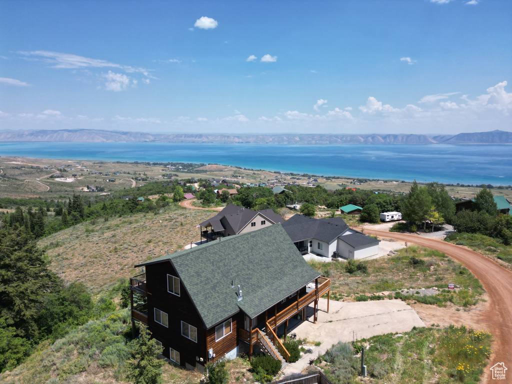 View of subject property featuring a large body of water