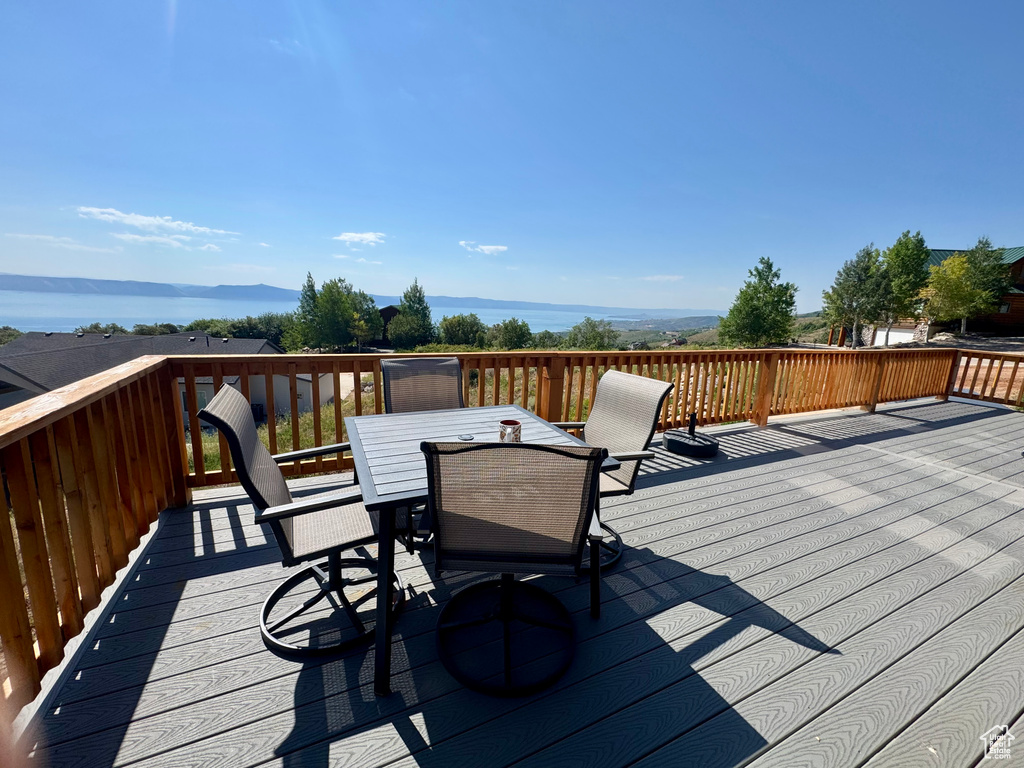 Wooden terrace with outdoor dining space