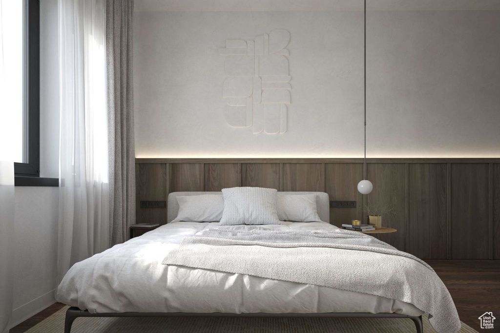 Bedroom featuring dark wood-style floors