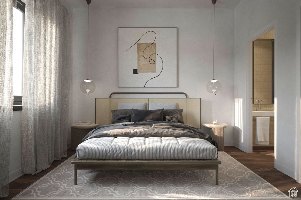 Bedroom featuring dark wood-type flooring and connected bathroom