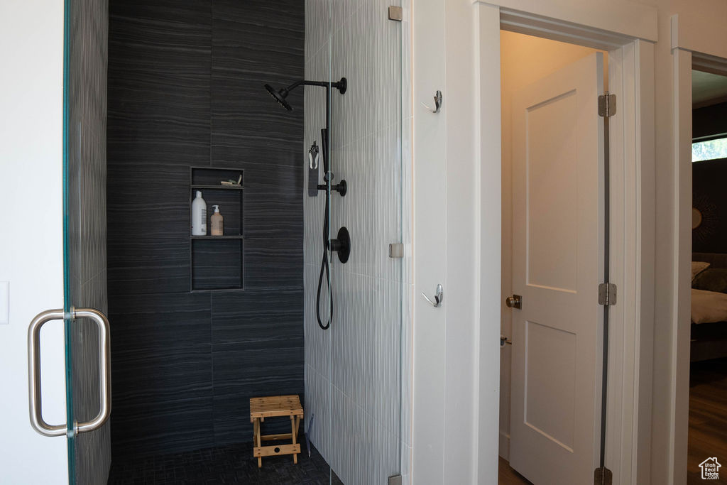 Full bathroom featuring a stall shower