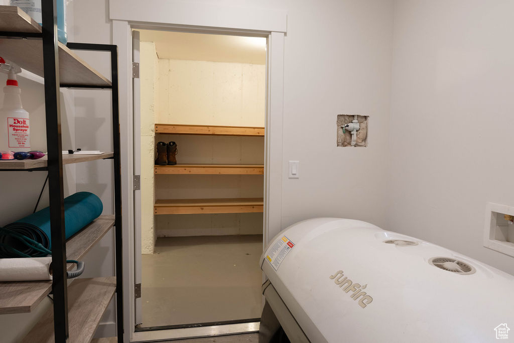 Bedroom with concrete flooring