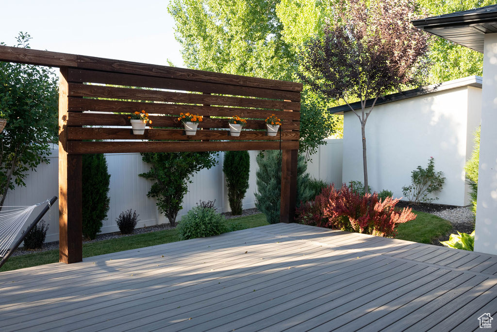 Wooden terrace with a pergola