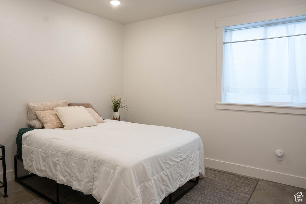 Bedroom with baseboards and recessed lighting