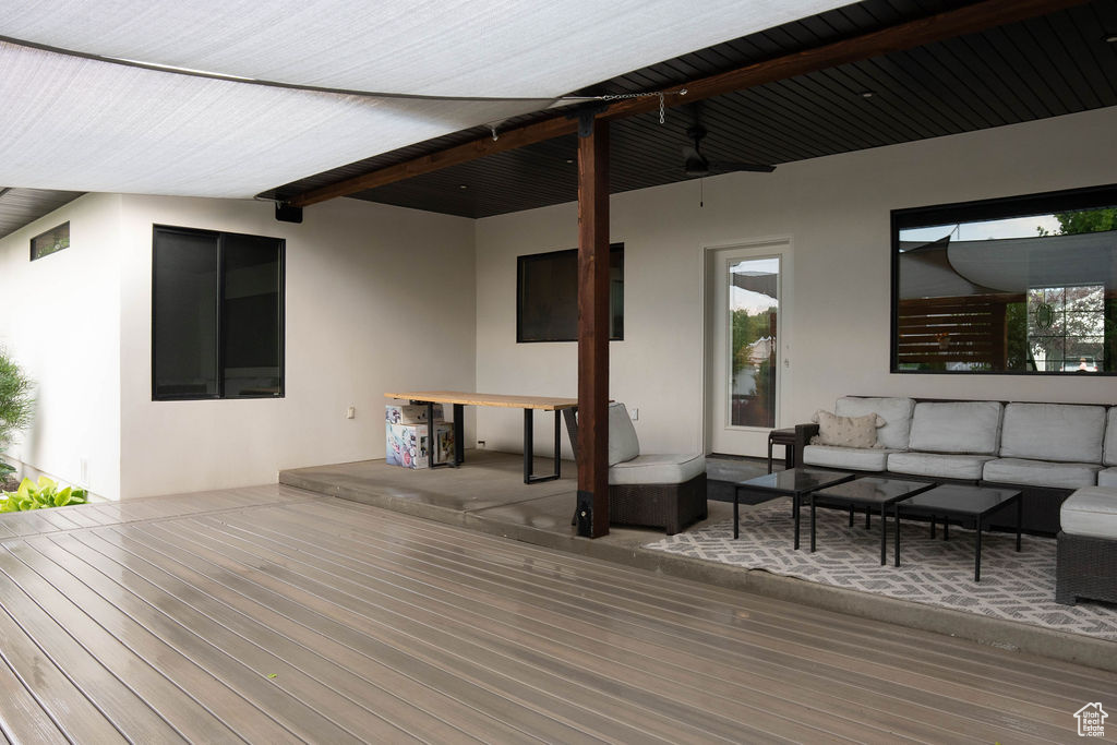 Deck with an outdoor living space