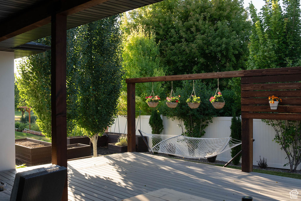 Wooden terrace with a garden
