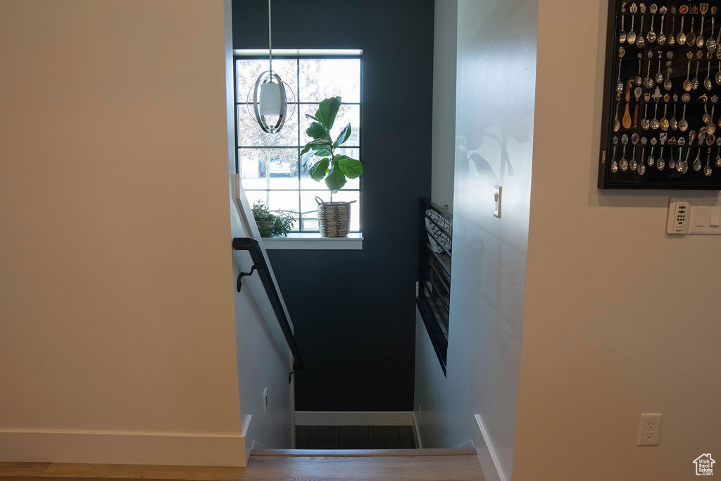 Stairs featuring baseboards