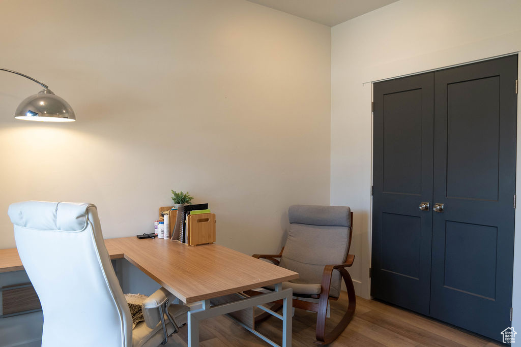 Office area featuring wood finished floors