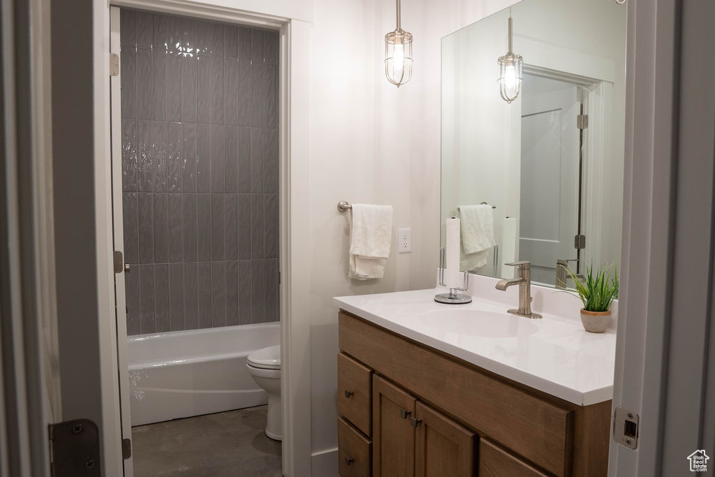Bathroom featuring vanity and shower / tub combination