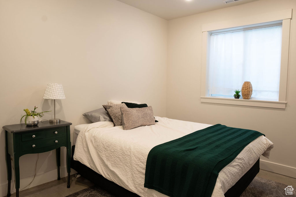 Bedroom featuring baseboards