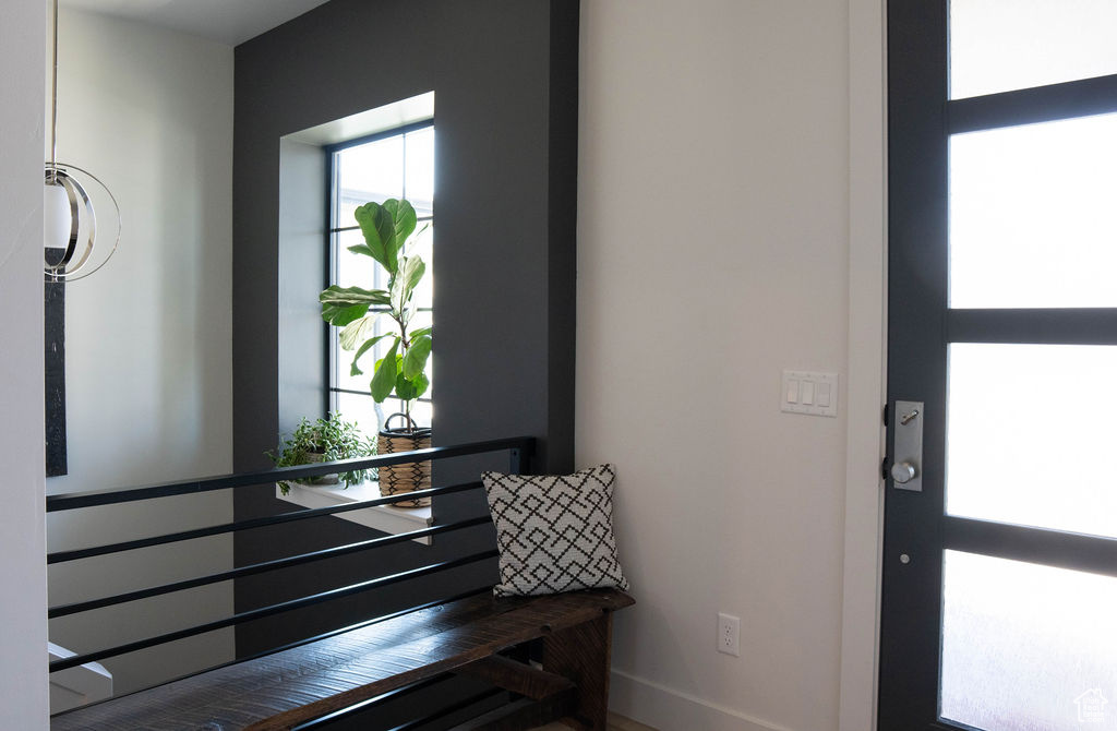 Foyer entrance featuring baseboards