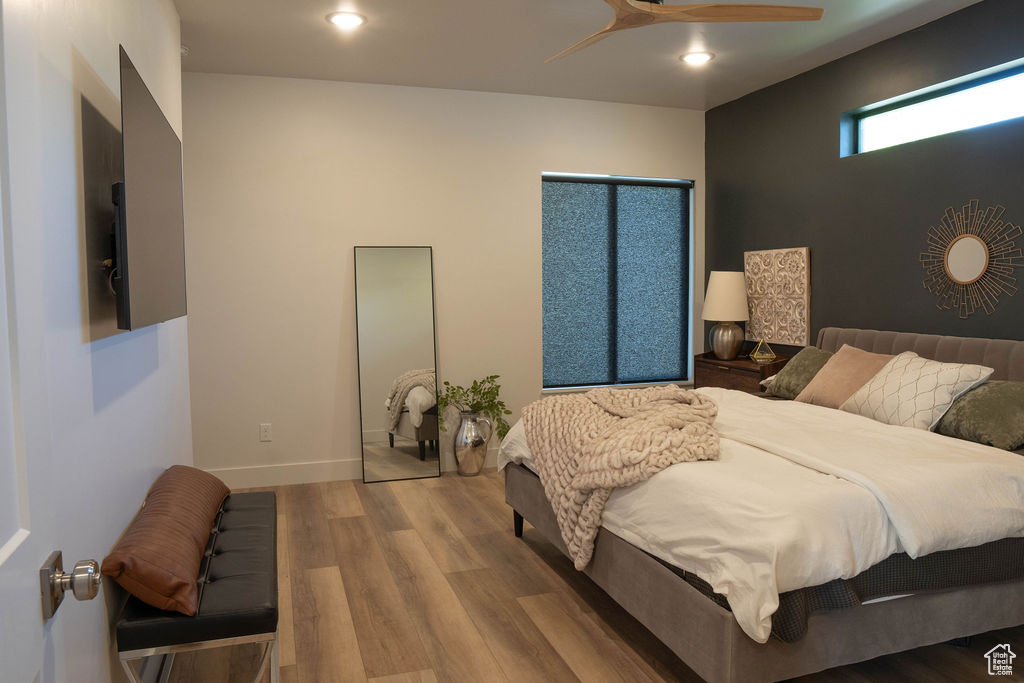 Bedroom featuring recessed lighting and wood finished floors