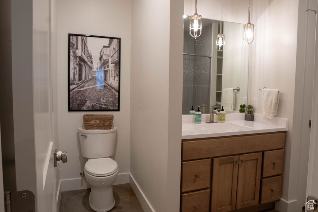 Bathroom featuring toilet and vanity