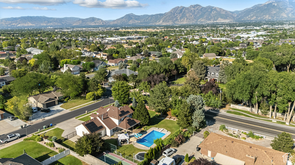 Aerial overview of property's location featuring nearby suburban area
