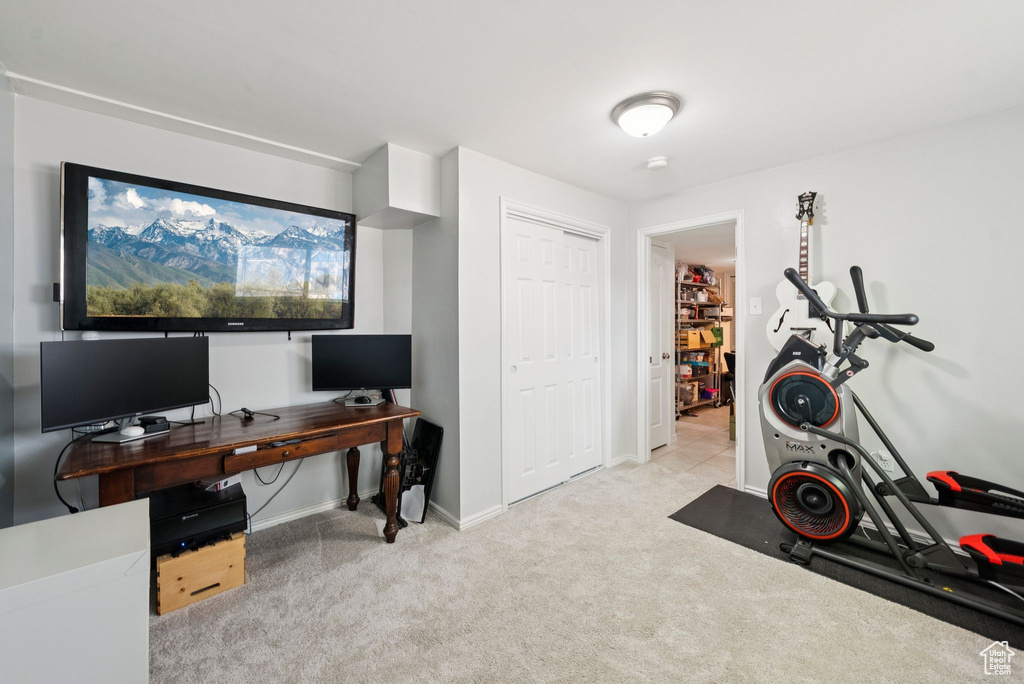 Carpeted office with baseboards