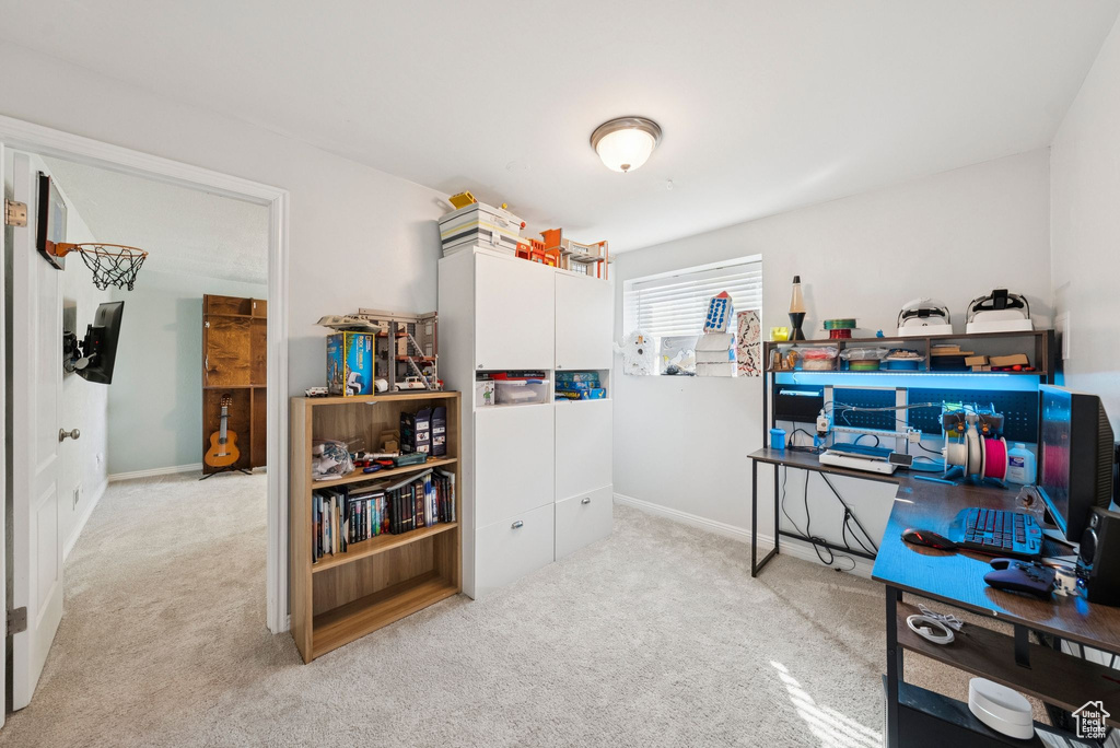 Office area featuring carpet flooring
