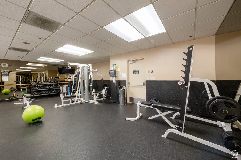 Gym featuring a paneled ceiling