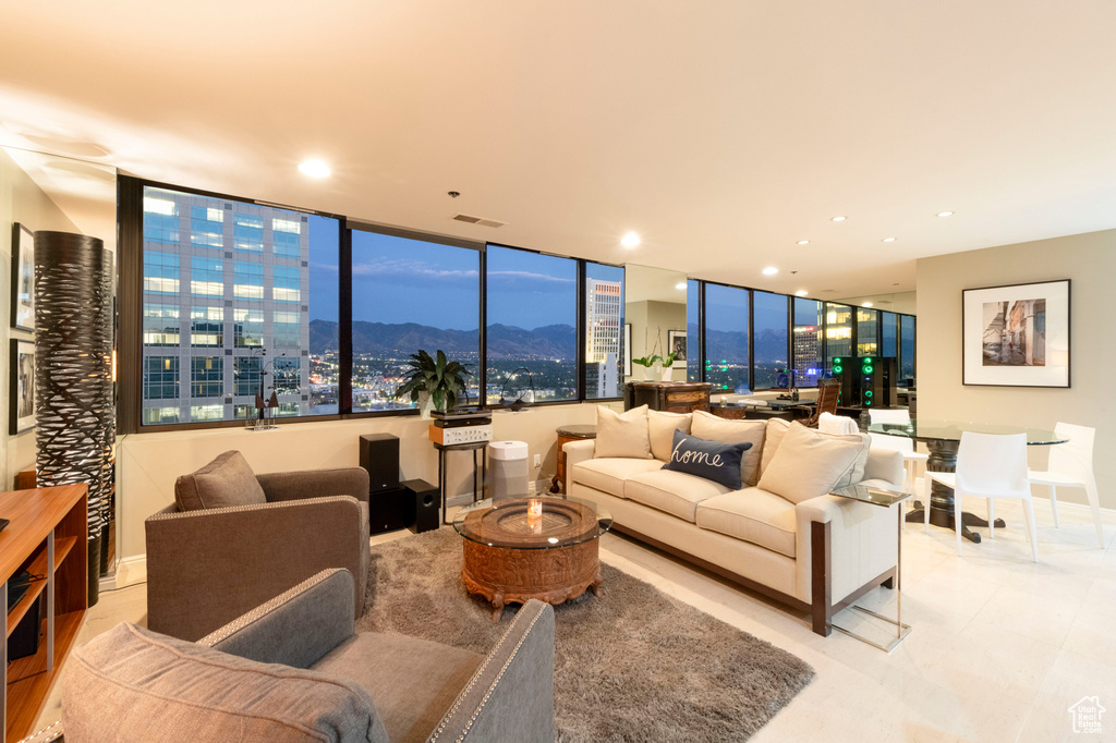 Living room with a mountain view and recessed lighting