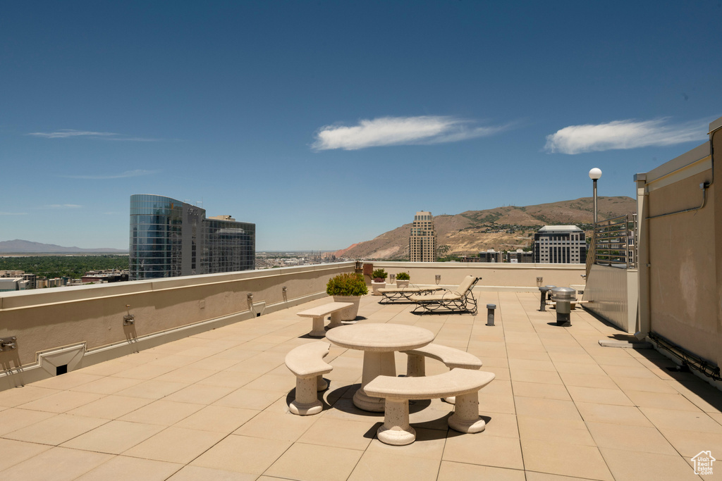 View of patio with a mountain view