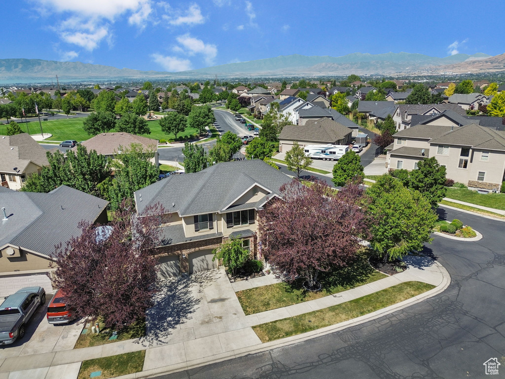 Aerial view of residential area with a mountainous background