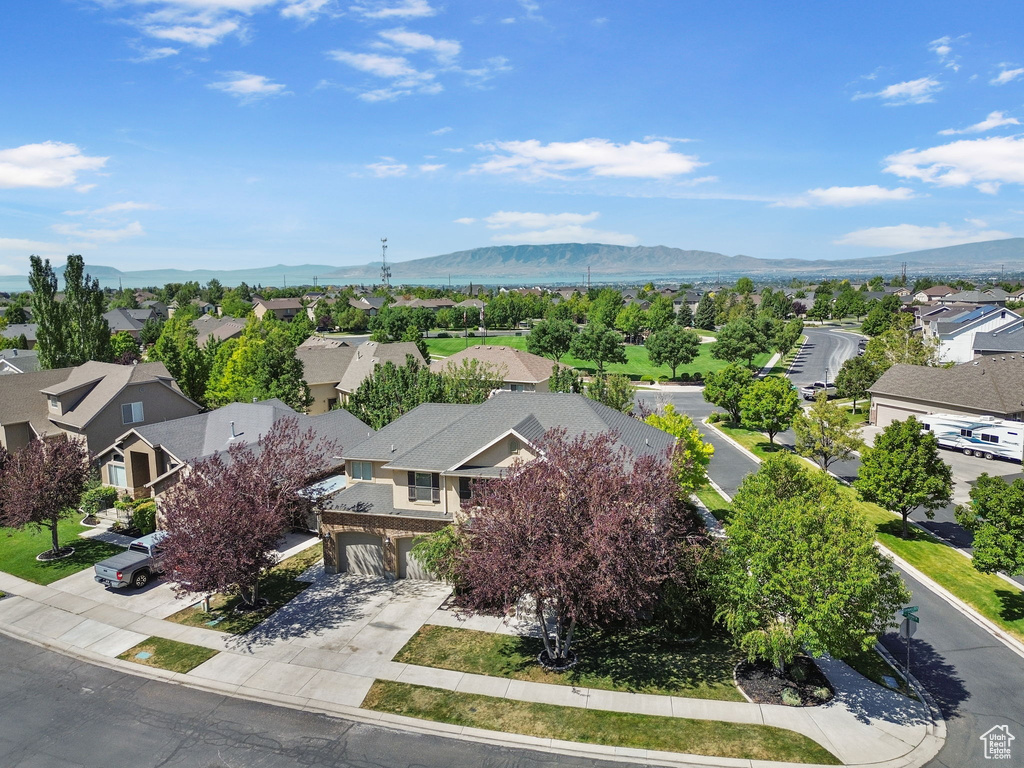 Aerial perspective of suburban area featuring mountains