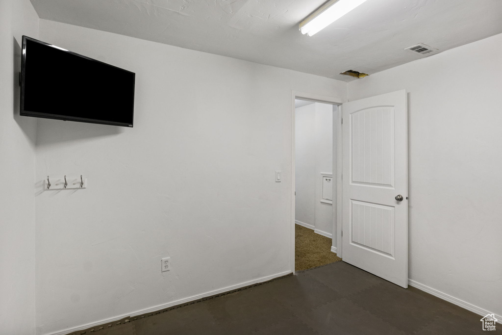 Unfurnished bedroom featuring baseboards