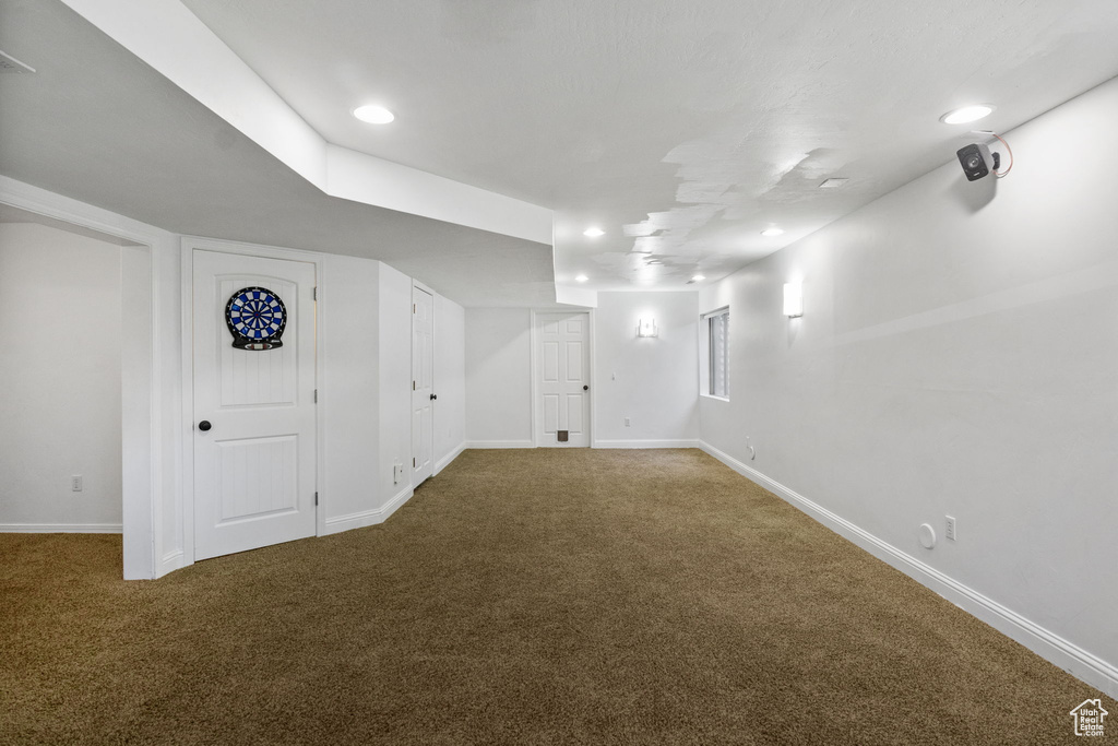 Finished below grade area featuring carpet and recessed lighting