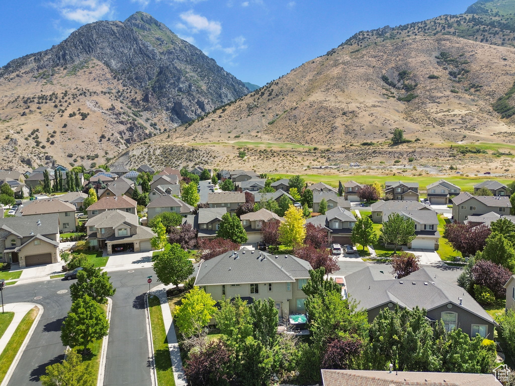 View of mountain background featuring nearby suburban area