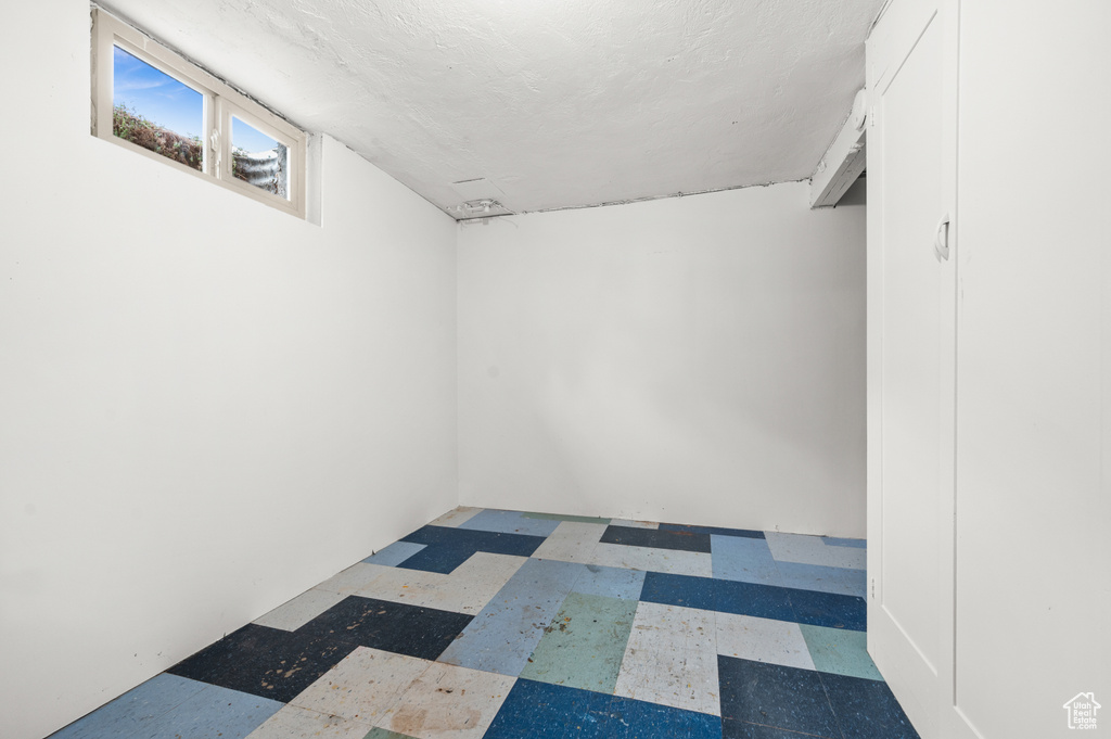 Below grade area with tile patterned floors